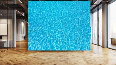 Beautiful water surface in swimming pool with sun reflection Wall mural