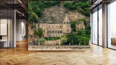 Front view of the beautiful old stone church at Gellért Hill Cave i Budapest Hungary. Wall mural