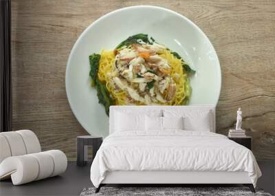 Chinese egg yellow noodles topping crab meat on plate Wall mural