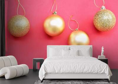 golden ball for decoration in Christmas and new year festival in red background Wall mural