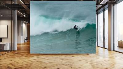 professional surfer riding waves, men catching waves in ocean, isolated. Surfing action water board sport. people water sport lessons and beach swimming activity on summer vacation Wall mural