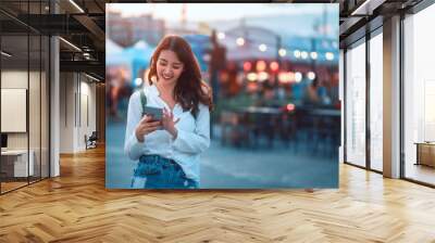 Travel woman in street market Wall mural