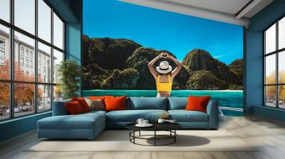 Traveler asian bikini woman relax and travel on boat in Maya Bay Phuket Thailand Wall mural