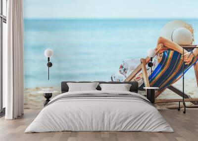 Woman on beach in summer Wall mural