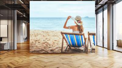 Woman on beach in summer Wall mural