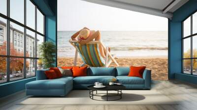 Woman on beach in summer Wall mural