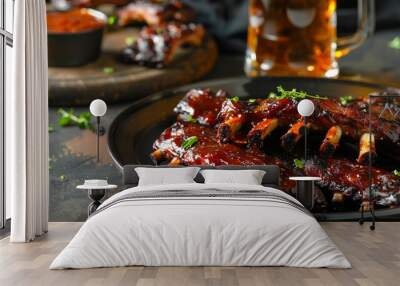 A plate of delicious BBQ pork ribs with a glass of beer Wall mural