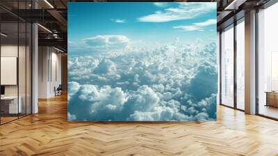 Clouds drift lazily across the azure expanse, painting ever-changing patterns in the sky. Wall mural