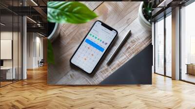 Create an image of a smartphone displaying a calendar and to-do list app, emphasizing productivity and organization. Wall mural