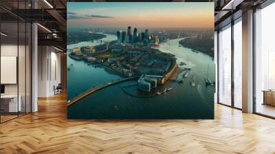 Discover the tranquility of the Thames Barrier and the Docklands area from an aerial view, highlighting the blend of nature and urban development. Wall mural