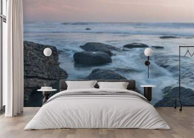 Volcanic rock with romantic sky Wall mural