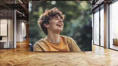 happy young disabled teenager enjoying sunshine outdoors Wall mural