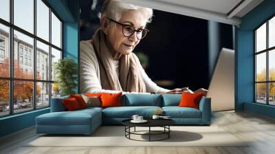 Older woman using a laptop computer. Generative AI Wall mural