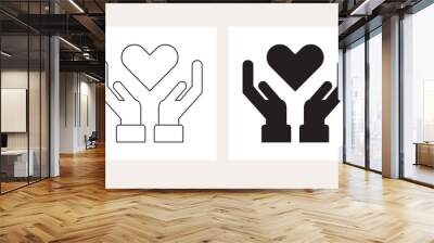 Black silhouette and thin line conceptual two open hands holding heart sign icons set on white background  Wall mural