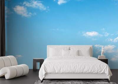 beautiful summer sky background. lots of white fluffy clouds on the blue sky. vivid nature background. calm and sunny weather Wall mural