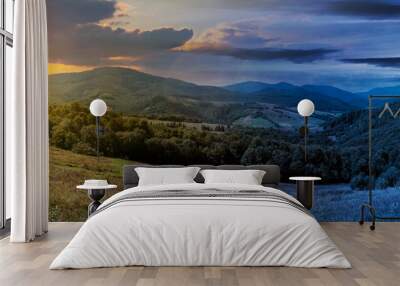 day and night time change concept above carpathian countryside in september at twilight. beautiful mountain landscape with grassy field on rolling hill beneath a sun and full moon. clouds on the sky Wall mural