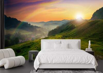 hillside near the village in morning mist Wall mural