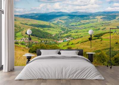 mountainous countryside scenery of ukraine on a sunny autumn day. rolling hills and grassy pastures Wall mural