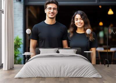 A couple boyfriend and girlfriend wearing blank black matching t-shirts mockup for design template Wall mural