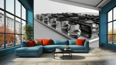 Close-up of a modern stainless steel gas stovetop Wall mural