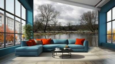 view of the River Avon at Salisbury Wiltshire England after it has burst its banks and flooded fields behind Wall mural