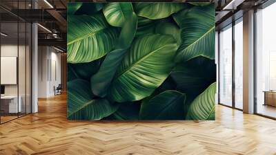 Lush green tropical leaves with veins. Wall mural