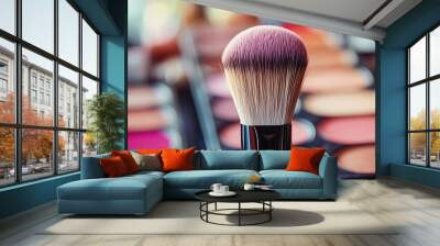 Makeup brush with colorful eyeshadow palette. Wall mural