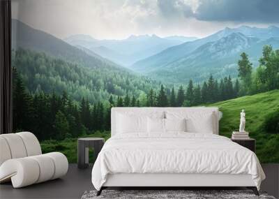 Winding dirt road through a lush green mountain valley. Wall mural