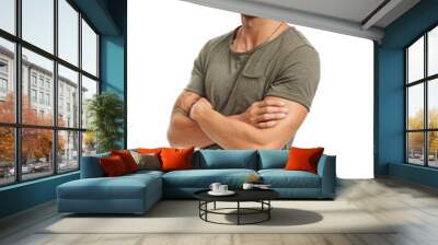 A handsome young man standing with arms crossed Isolated on a PNG background. Wall mural