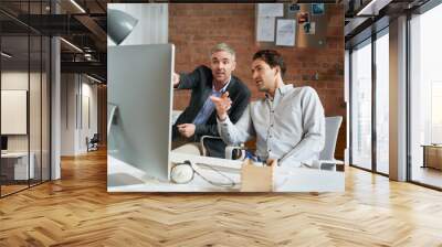 Advice, planning and business people in office with computer, discussion and creative collaboration. Teamwork, web design and men at desk for opinion, partnership and consulting at digital agency Wall mural