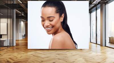 Beauty, smile and woman with skincare in studio for facial glow and wellness. Skin health, dermatology and happy female person with collagen cosmetics for results and isolated by white background Wall mural