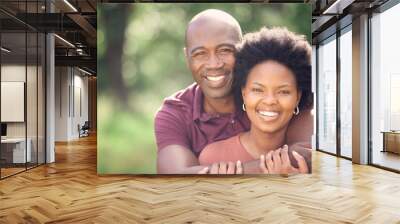 Black couple, hug and love in field for portrait, affection and support in outdoor nature to connect. People, marriage and embrace for security in relationship, travel and care on vacation in woods Wall mural