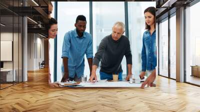 Business people, architect or team in meeting with blueprint for building design, brainstorming or strategy. Architecture, employee or collaboration with floor plan in boardroom for creative planning Wall mural