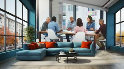 Business people, meeting and discussion with creative team for collaboration, planning or brainstorming at office. Group of employees talking in boardroom, conference or ideas in startup at workplace Wall mural