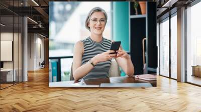 Business woman, portrait and phone for news, communication and client management in office. Mature consultant, face and mobile for research, networking and company development with investment growth Wall mural