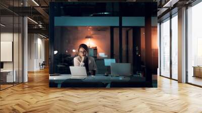 Business woman, stress and laptop in office for corporate communication, internet research and networking. Female person, technology and frustrated working late night for project planning and email Wall mural