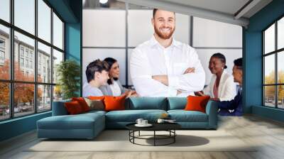 Businessman, portrait and happy with team for company growth, financial management or leadership. Discussion, investment ideas or training and entrepreneur, planning and collaboration for workshop Wall mural