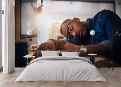 Businessman, sleeping and night with documents in fatigue, stress or burnout on office desk. Tired man or bored employee asleep with paperwork in late evening, overworked or depression at workplace Wall mural