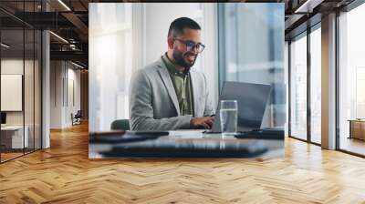 Businessman, typing and happy with laptop in office for project management feedback and positive website review. Web designer, employee and smile with tech for planning, networking and info update Wall mural