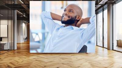 Calm, relax and happy black man in office after finishing work project, planning or complete job in business. Peace of mind, stretching and employee resting for freedom, dream and thinking of future Wall mural