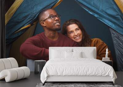 Camping, nature and couple embrace in tent with morning drink, happy vacation or romantic date. Relax, man and woman bonding together on holiday with coffee, hug and calm outdoor adventure in woods. Wall mural