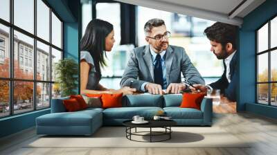 Coaching, training and collaboration, team and table in office on project management with manager. Leadership, planning and brainstorming, male mentor and teaching business colleagues in boardroom Wall mural