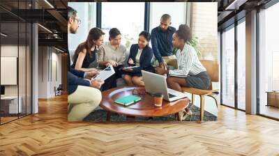 Collaboration, laptop and meeting with business people in lobby of office for discussion or planning. Computer, project management and teamwork with employee group in workplace for administration Wall mural