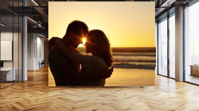 Couple, love and kiss at beach with sunset for date or summer holiday and bonding in Florida. Relationship, evening and romance together as soulmate with smile, vacation and happy with forehead touch Wall mural