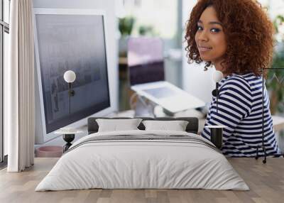 Creative, office and portrait of black woman at computer with productivity on project or writing email. Happy, employee and working at desktop with development on task and typing online communication Wall mural