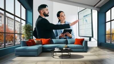 Data, presentation and business people with tablet in the office for project statistics planning, Discussion, technology and financial advisors analyzing finance graphs in collaboration at workplace. Wall mural