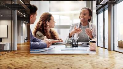 Discussion, meeting and business people in office for teamwork, planning or review at table. Collaboration, professional and group of diverse employees for ideas, conversation or project development Wall mural