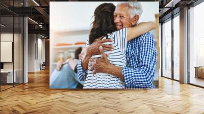 Elderly, father and woman hug in home with love, care and support in retirement from family. Senior, man and embrace dad at reunion on holiday, vacation or person with happiness and kindness in house Wall mural