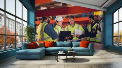 Employees, tablet and group in warehouse, teamwork and inventory with connection. People, factory and supervisor with tech, cooperation and conversation with communication, planning and logistics Wall mural