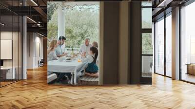 Food, brunch and table with family on house porch with wine for celebration or festive holiday. Cooking, feast or lunch with people eating in home together for party event or social gathering Wall mural